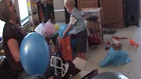 Birthday Boy Re-Wraps A Gift He Doesn't Want