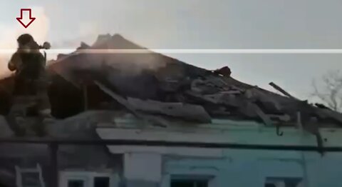 Chechen troops launch weapons on roofs of partially destroyed houses