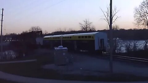 WB CN L571 Manifest with Two Ex-IANR Coaches on the end at Mills Tower on April 14, 2022