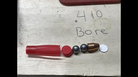 .410 critical defense style reloads. Two balls of 000 buckshot, 9mm hollowpoint slug