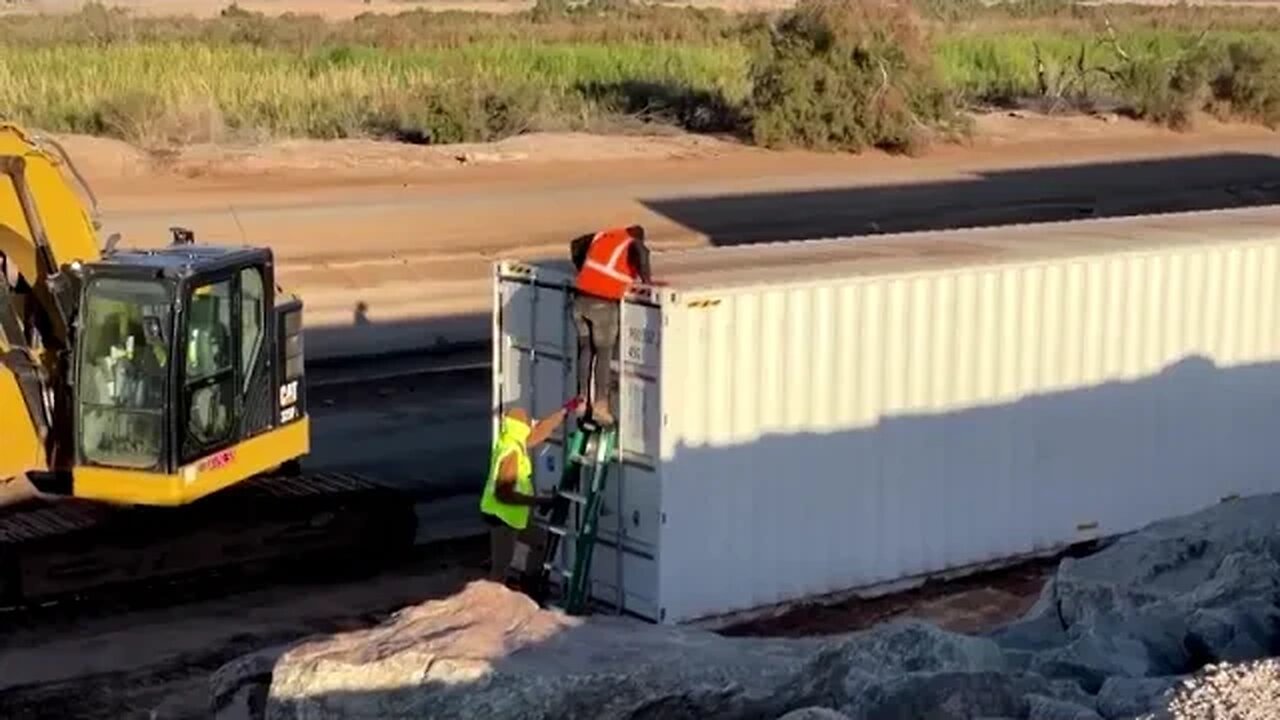 Arizona container wall removed amid federal lawsuit