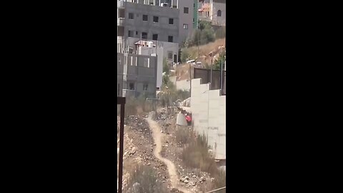 Footage shows a Palestinian man narrowly evading Israeli snipers in the Gaza.