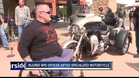 Paralyzed Officer Kevin Holtry treated to a new Harley