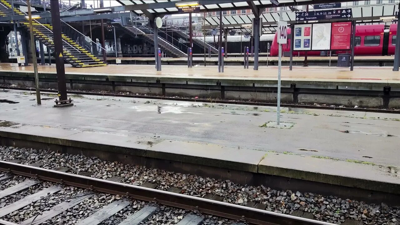 Rain over empty platforms at Copenhagen Central Station