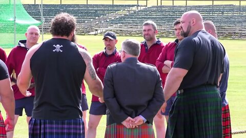 World's Strongest Men in a Tug o' War Challenge at Braemar Gathering Highland Games site in Scotland