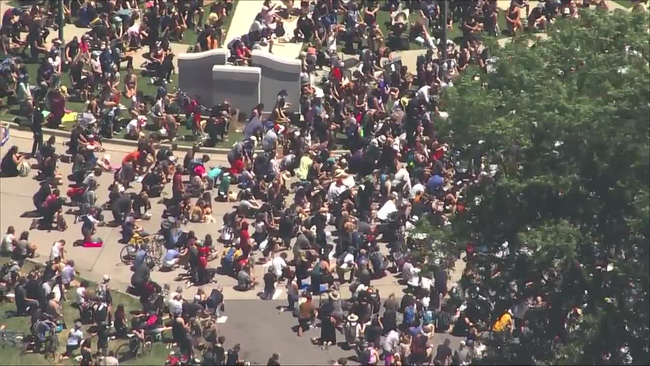 Thousands of protesters take a moment of silence in memory of George Floyd