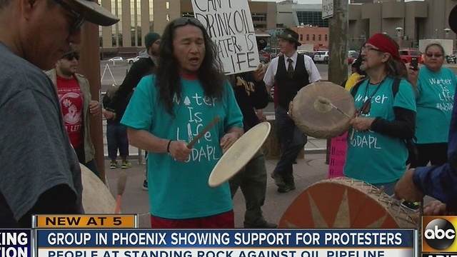 People hold North Dakota Access Pipeline protest in downtown Phoenix