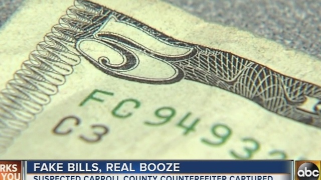 Man arrested for passing counterfeit $5 bills at liquor store