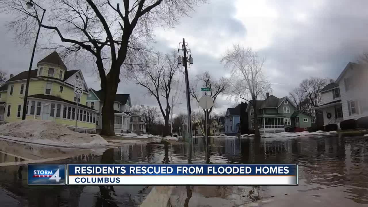 Dozens rescued from homes in Dodge County flooding