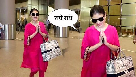 Mouni Roy greets paps with "Namaste" at the airport