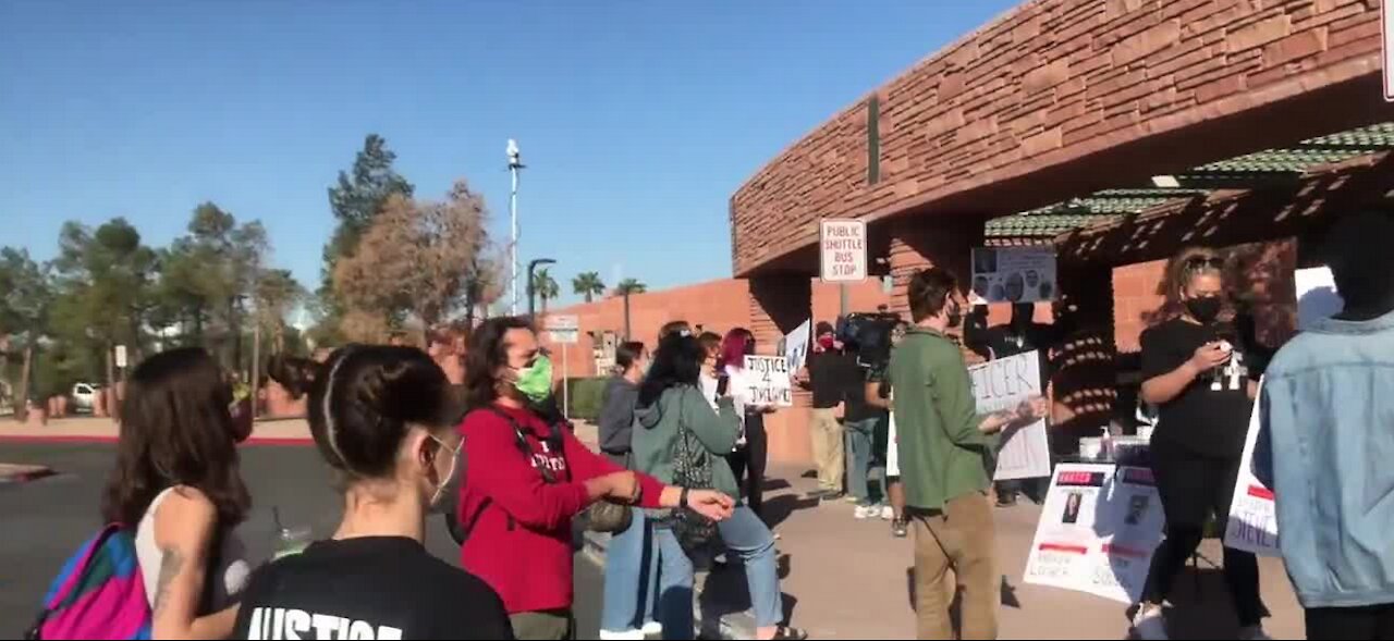 Protesters rally outside of Clark County Government Center right now