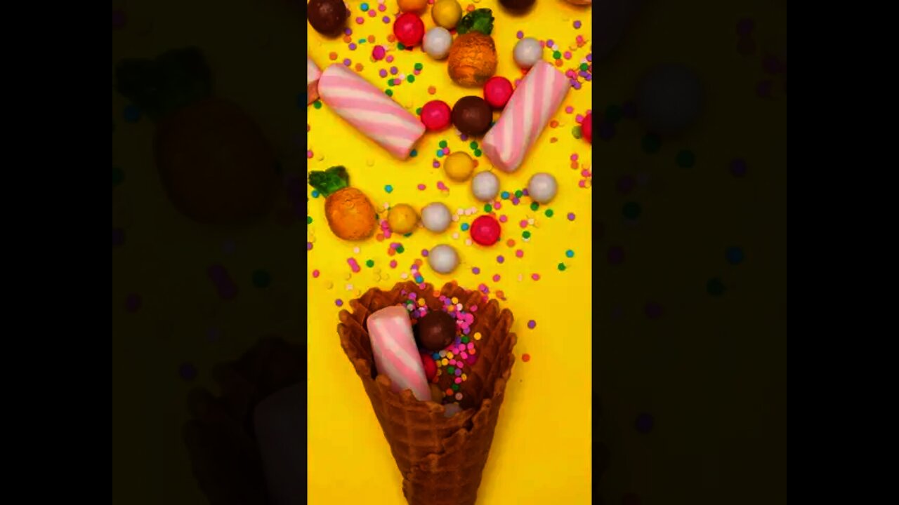 Candies in a waffle cone on a yellow background #Shorts