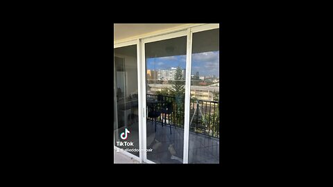 Hurricane impact sliding glass door repair; roller, lock, and handle replacement