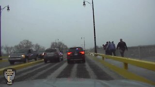 RAW: Dash camera video of OSP trooper saving man on Lorain bridge