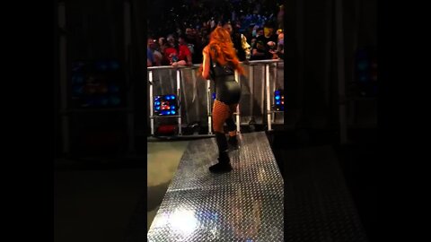 Becky Lynch arguing with the fan who hit her with Bianca Belair's help