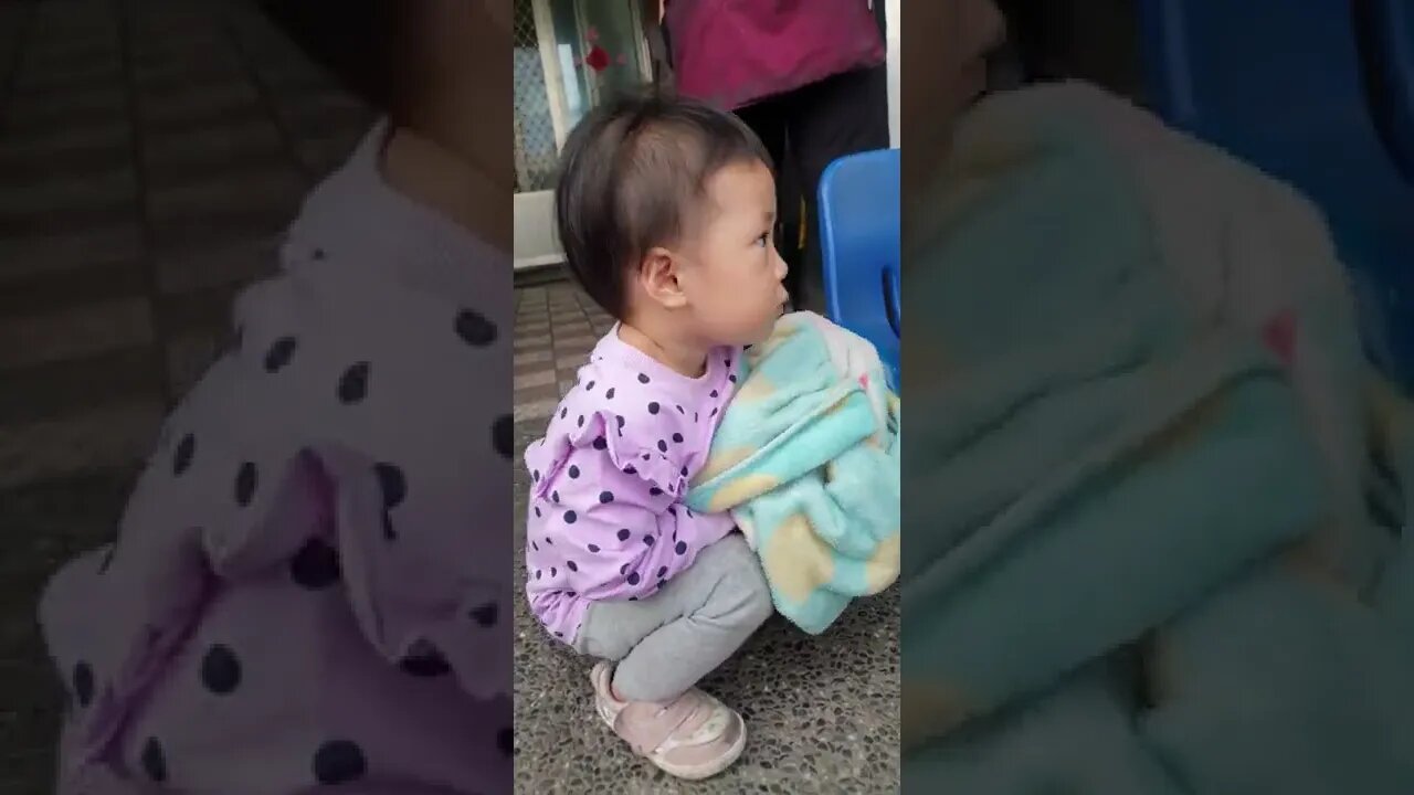 adorable baby girl and her pet bird