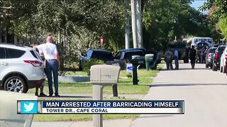 Man charged after standoff on Tower Dr.