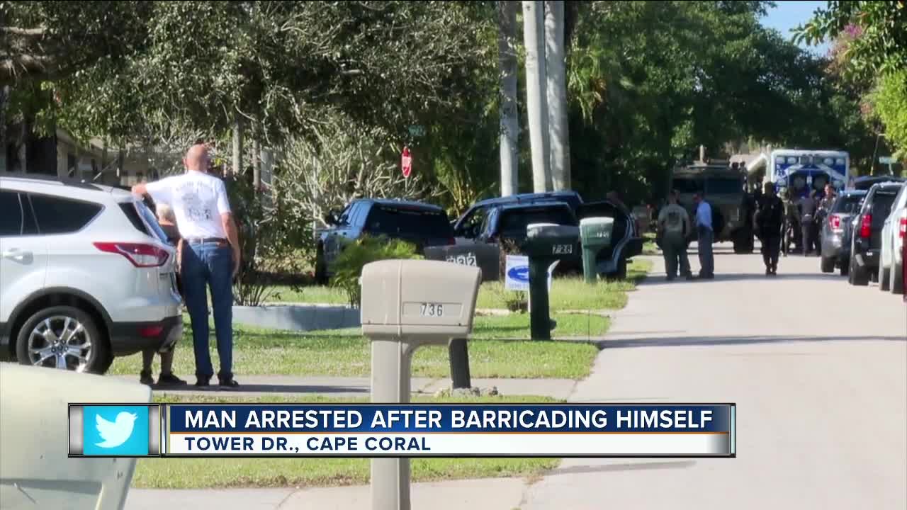 Man charged after standoff on Tower Dr.