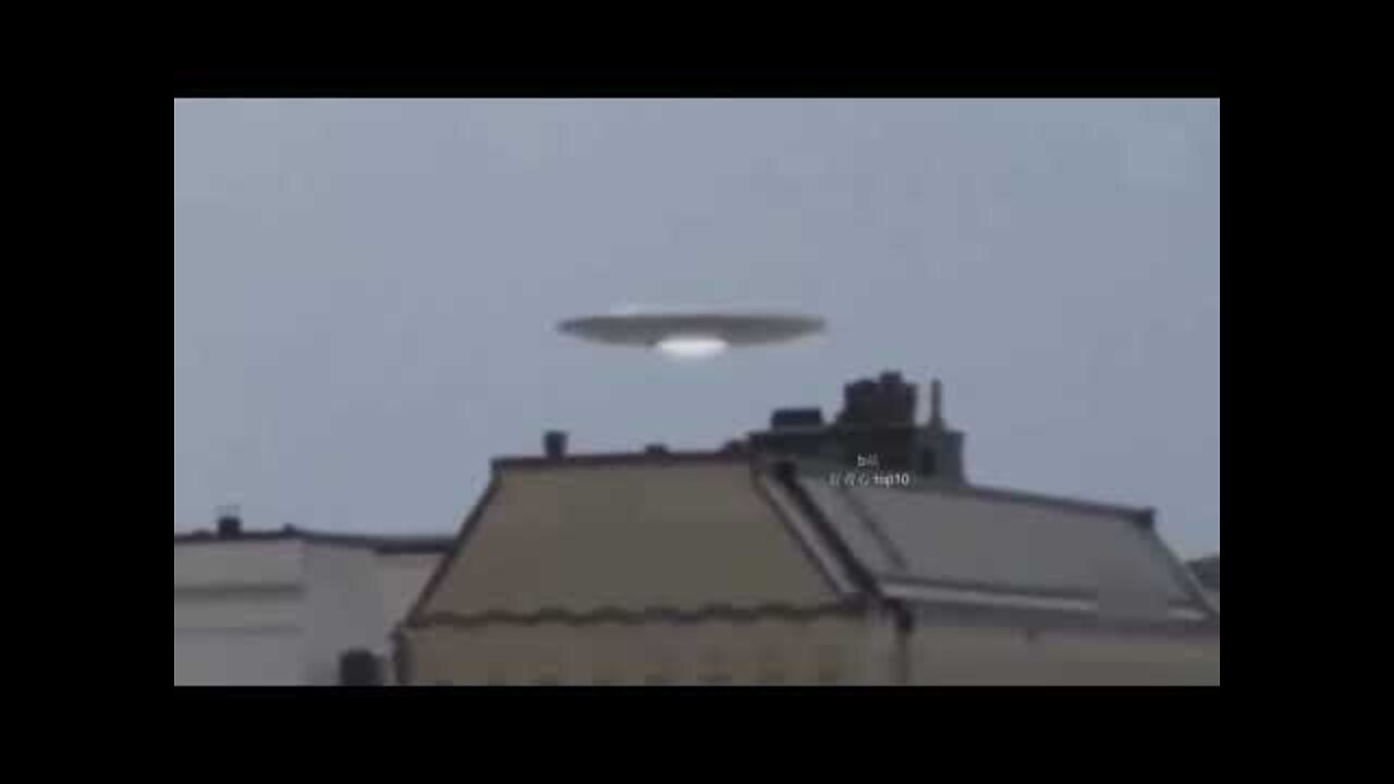 001 - UFO captured above unknown city
