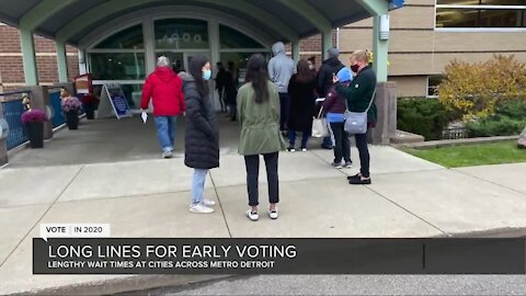 Metro Detroit voters wait hours to vote early on Friday