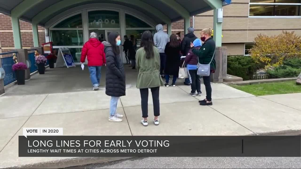 Metro Detroit voters wait hours to vote early on Friday