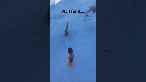 LEGO Man Tries to Snowboard