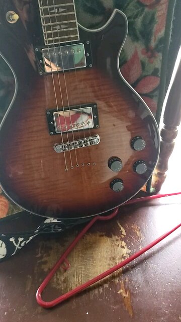 at my Garage about to learn how to play guitar