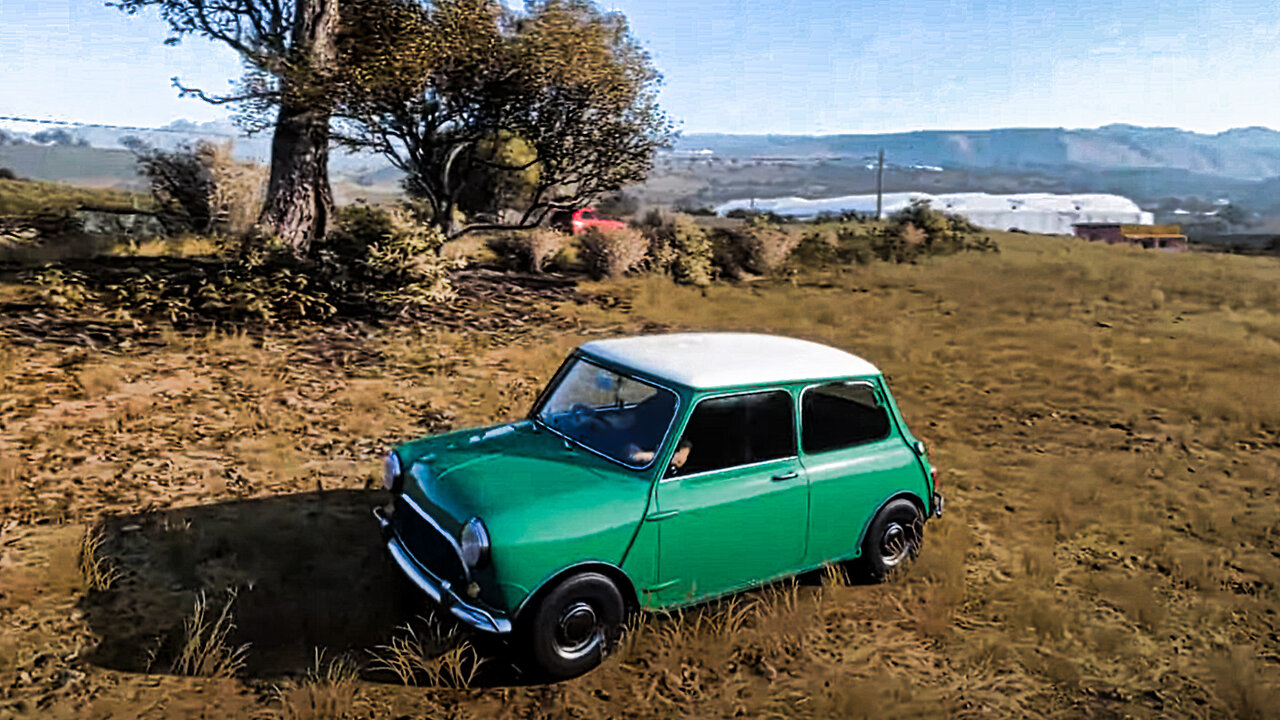 1965 Mini Cooper S. Is it fun? It seems like it might be fun. Get my 12-inch wheels rolling.