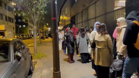 Footage shows hundreds of people waiting in queue for food distribution in French capital Paris