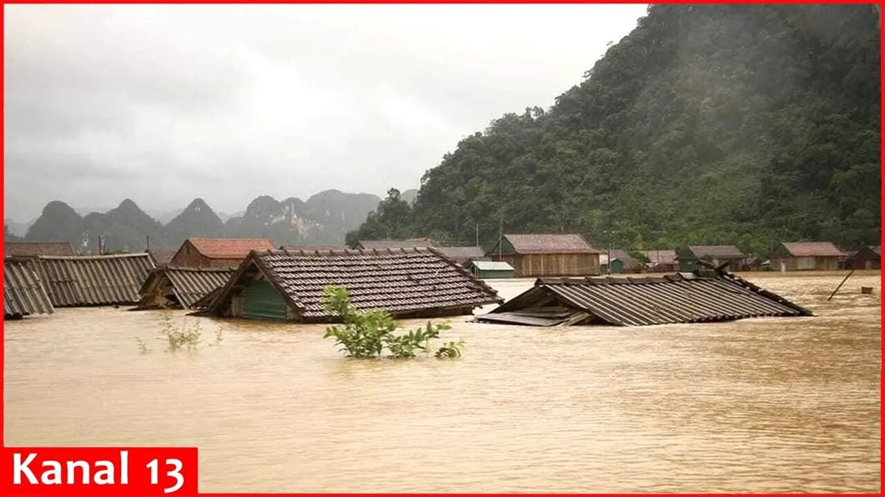 Mud and debris from floods bury village in north Vietnam killing at least 16, leaving dozens missing