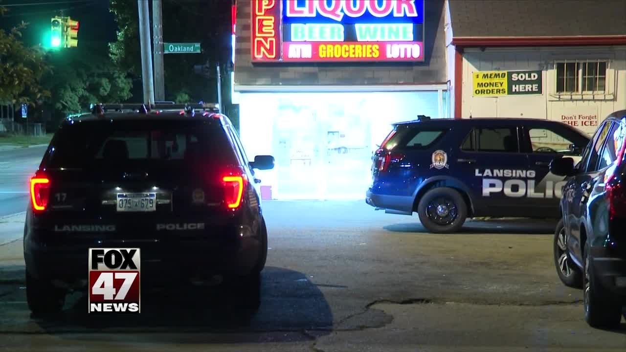 Liquor store robbed at gunpoint in Lansing