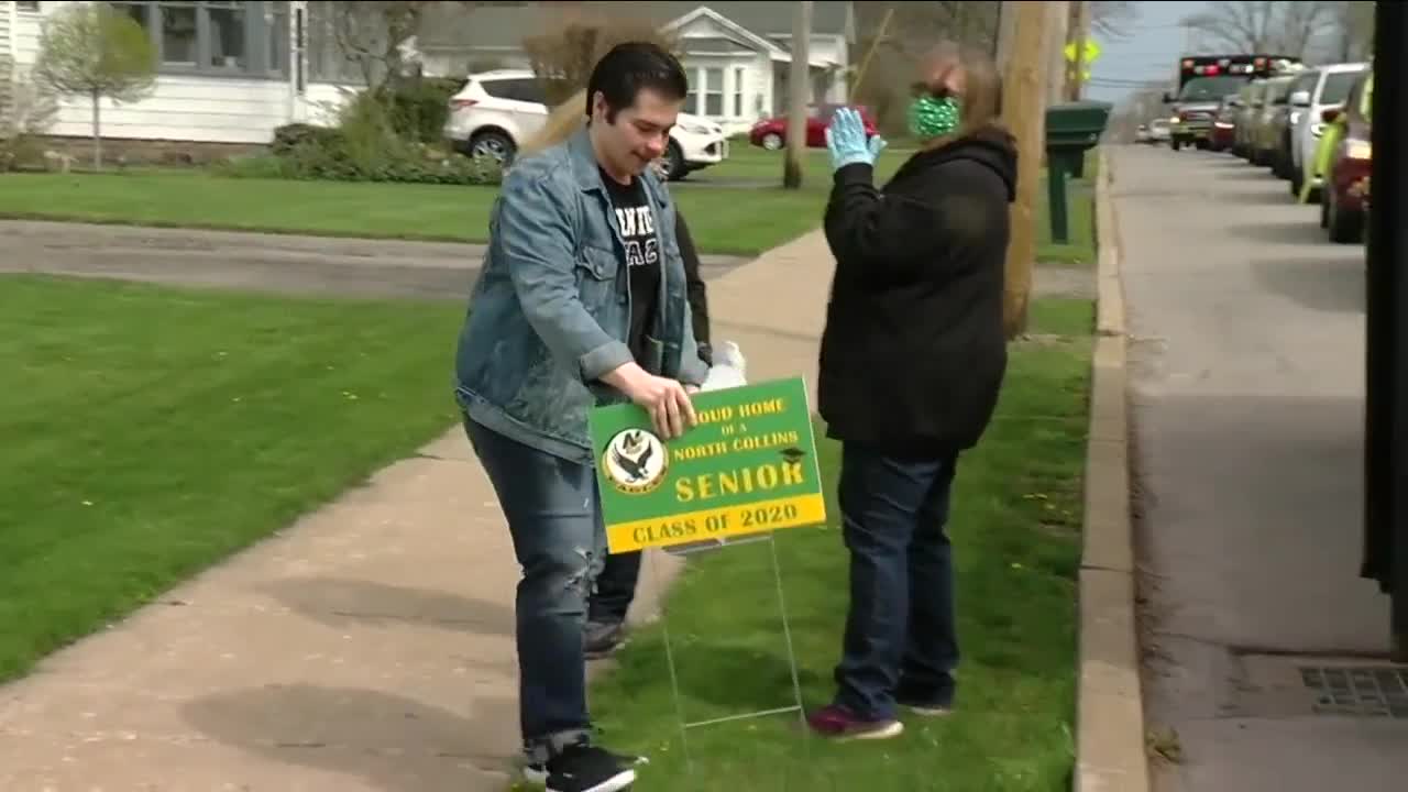 High school seniors celebrated with lawn signs