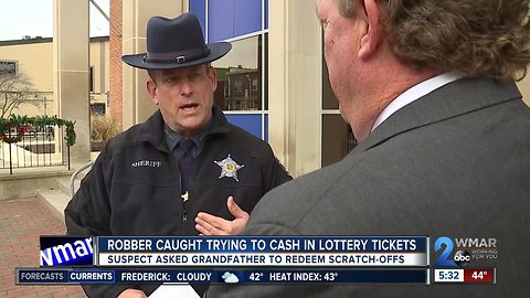 Robber caught trying to cash in lottery tickets