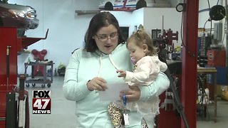 Local mom receives car from auto shop