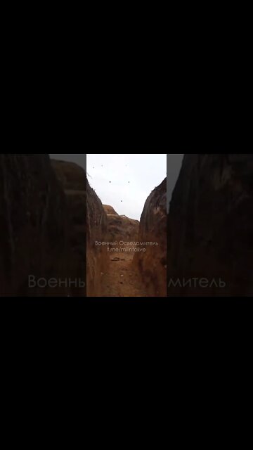 Russian artillery shelling from a Ukrainian trench