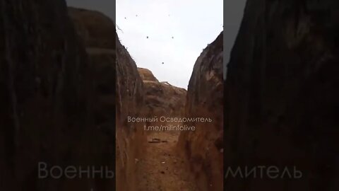 Russian artillery shelling from a Ukrainian trench