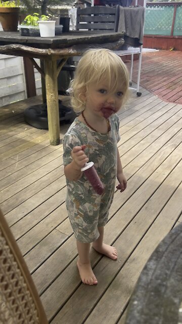 Alena enjoying healthy home made popsicle!