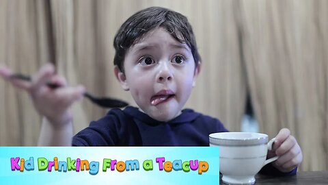 Kid Drinking from a Teacup