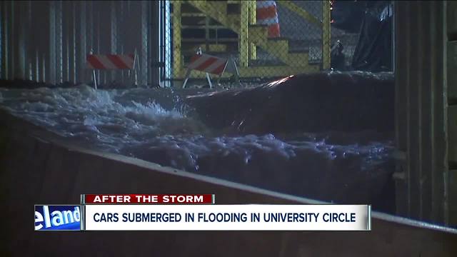 Cars submerged in flood waters in University Circle, rain may not have been the only factor