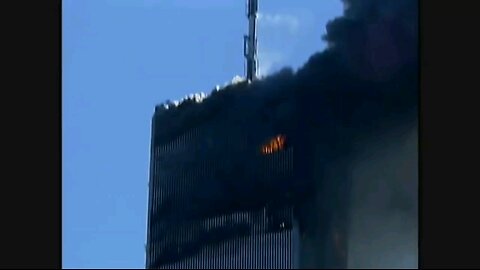 Smoke seen coming off of WTC1 antenna on 9/11 from a boat in the river. Only visible from this angle