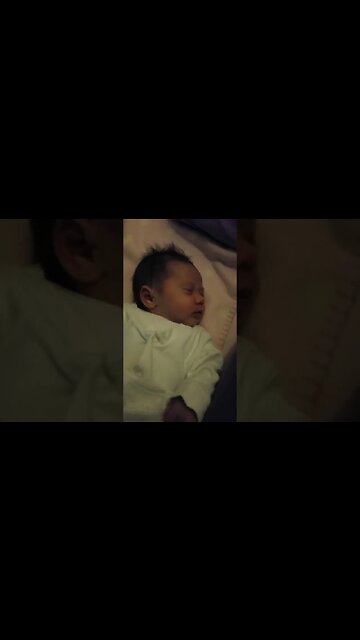 Sweet baby girl sleeps peacefully