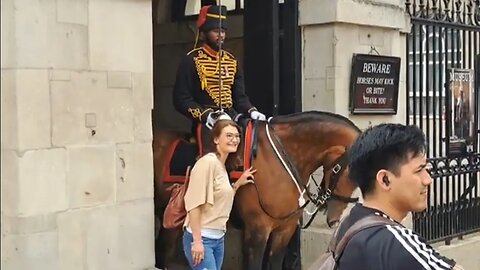 Another gets her picture taken holding her reins #horseguardsparade