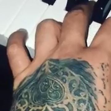 Amir Tataloo playing piano and singing a sad song