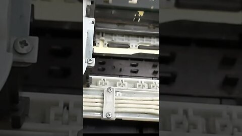 Epson engatando papel no lado