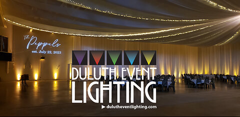 Wedding lighting in soft gold at the Eveleth Curling Club