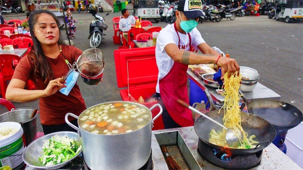 The couple sell fried rice at a roadside stall