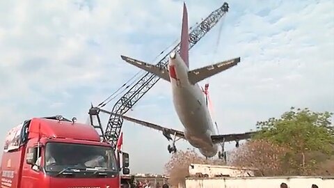 Crane Collapses And Drops Plane