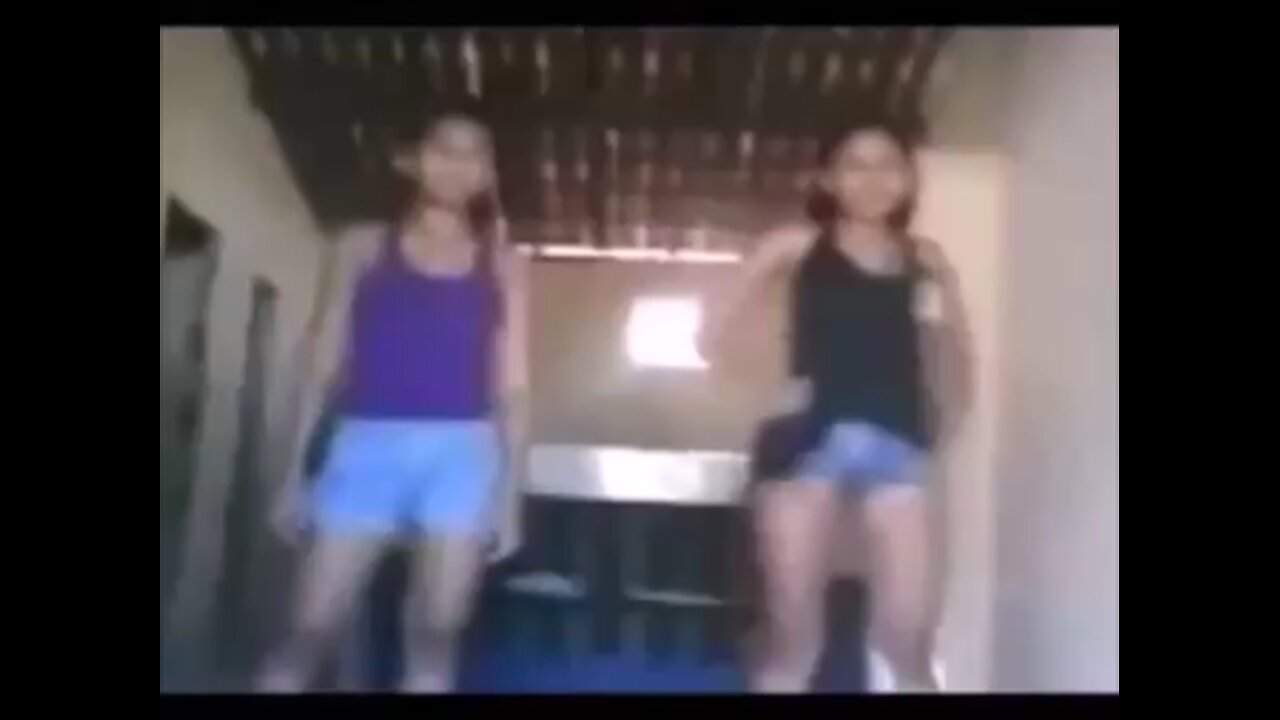 Strange creature appears in video of dancing girls. What is it? Demon? Ghost?