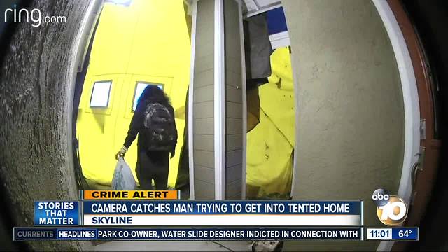 Camera catches man trying to get into tented home