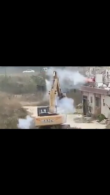 China Man Appears to Fights Off an Excavator Sent to Demolish His Building with Firework